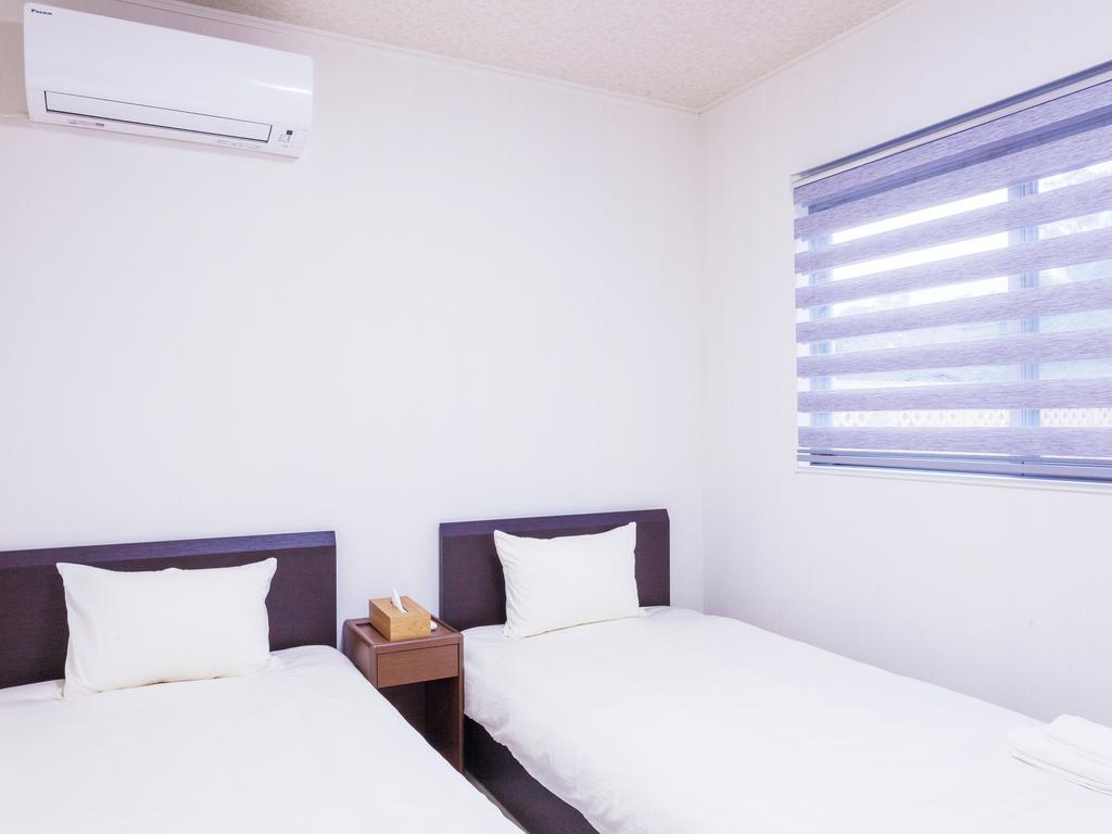 Kariyushi Condominium Resort Nago Rb Villa Накідзин Екстер'єр фото
