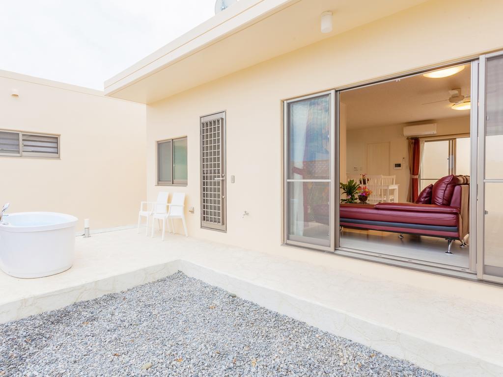 Kariyushi Condominium Resort Nago Rb Villa Накідзин Екстер'єр фото